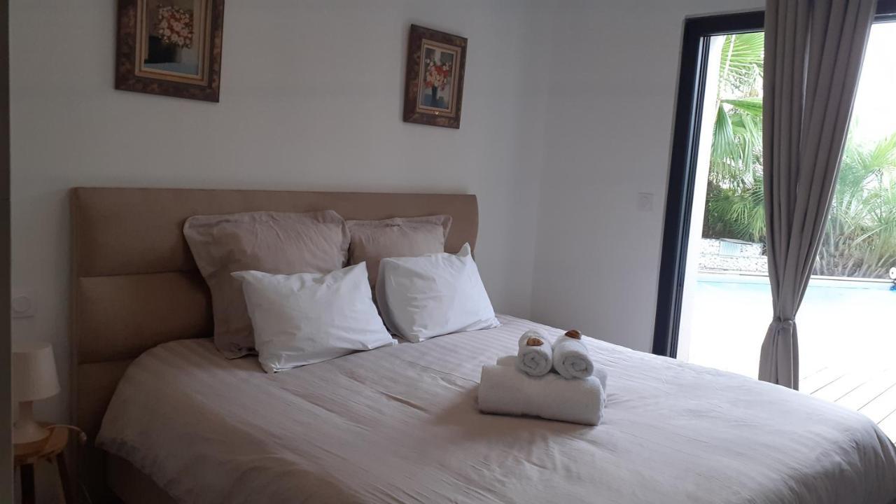 Bed and Breakfast Les palmiers à Juvignac Extérieur photo